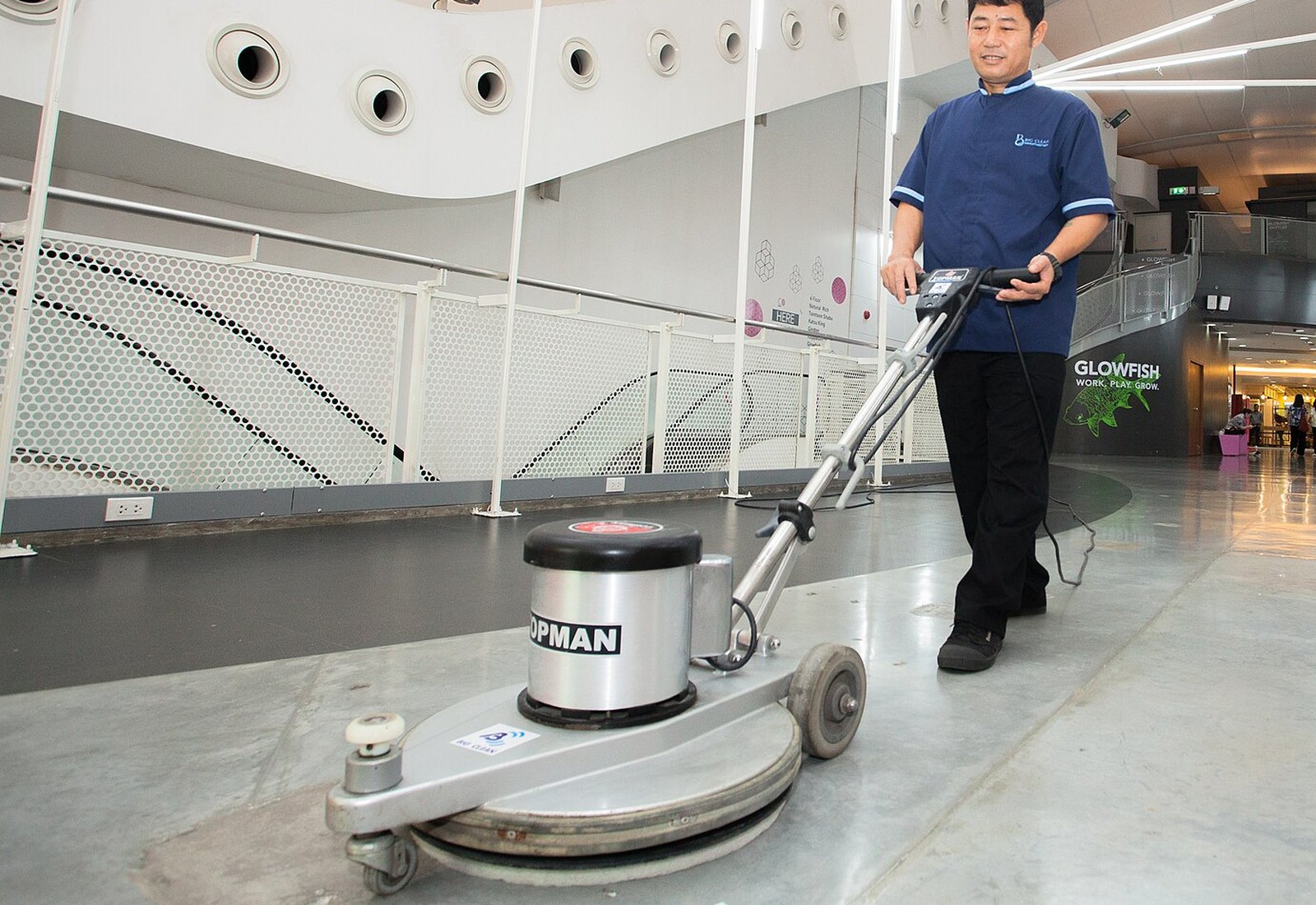A machine across a commercial floor &mdash; representative imagery, not a specific Perham Services job