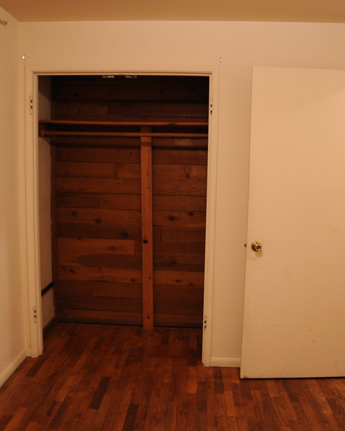 A bedroom vacuumed and mopped &mdash; representative imagery, not a specific Perham Services job